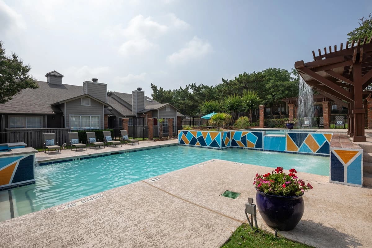 Resort-style swimming pools at Village Green of Bear Creek