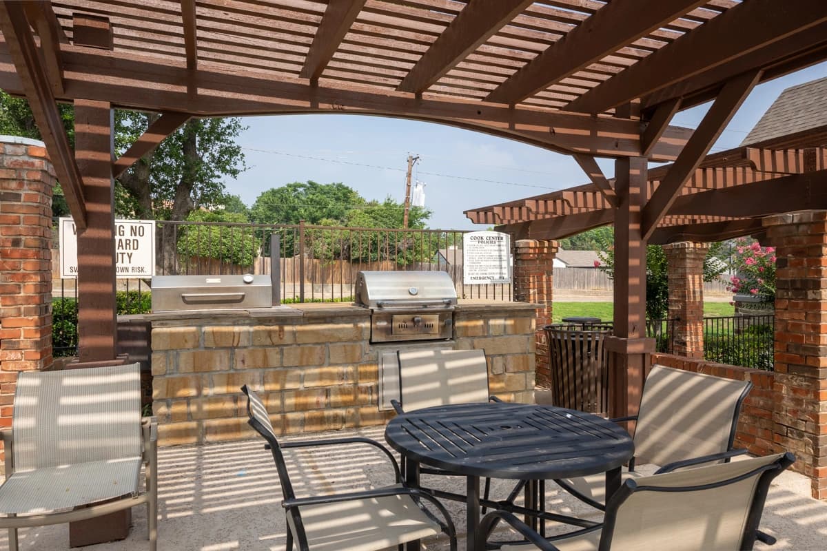 Pergola and picnic BBQ areas at Village Green of Bear Creek