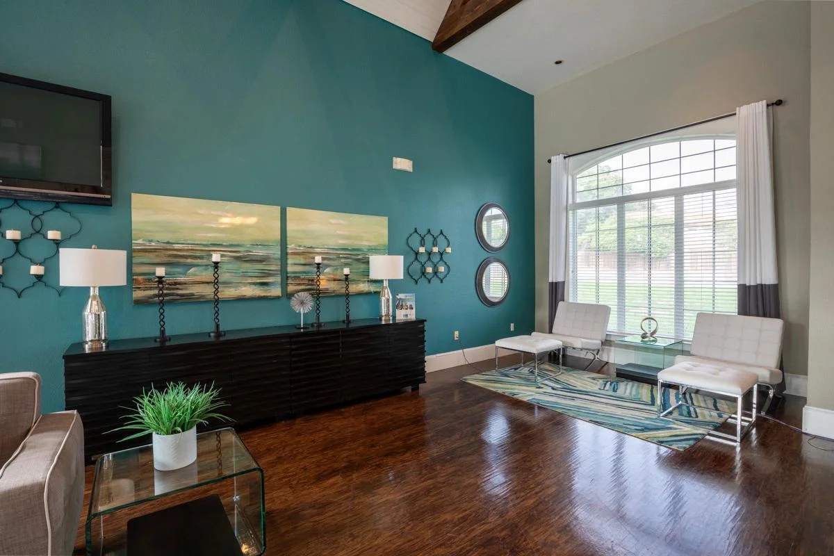 Clubhouse social lounge and entertainment space at Village Green of Bear Creek in Euless, Texas