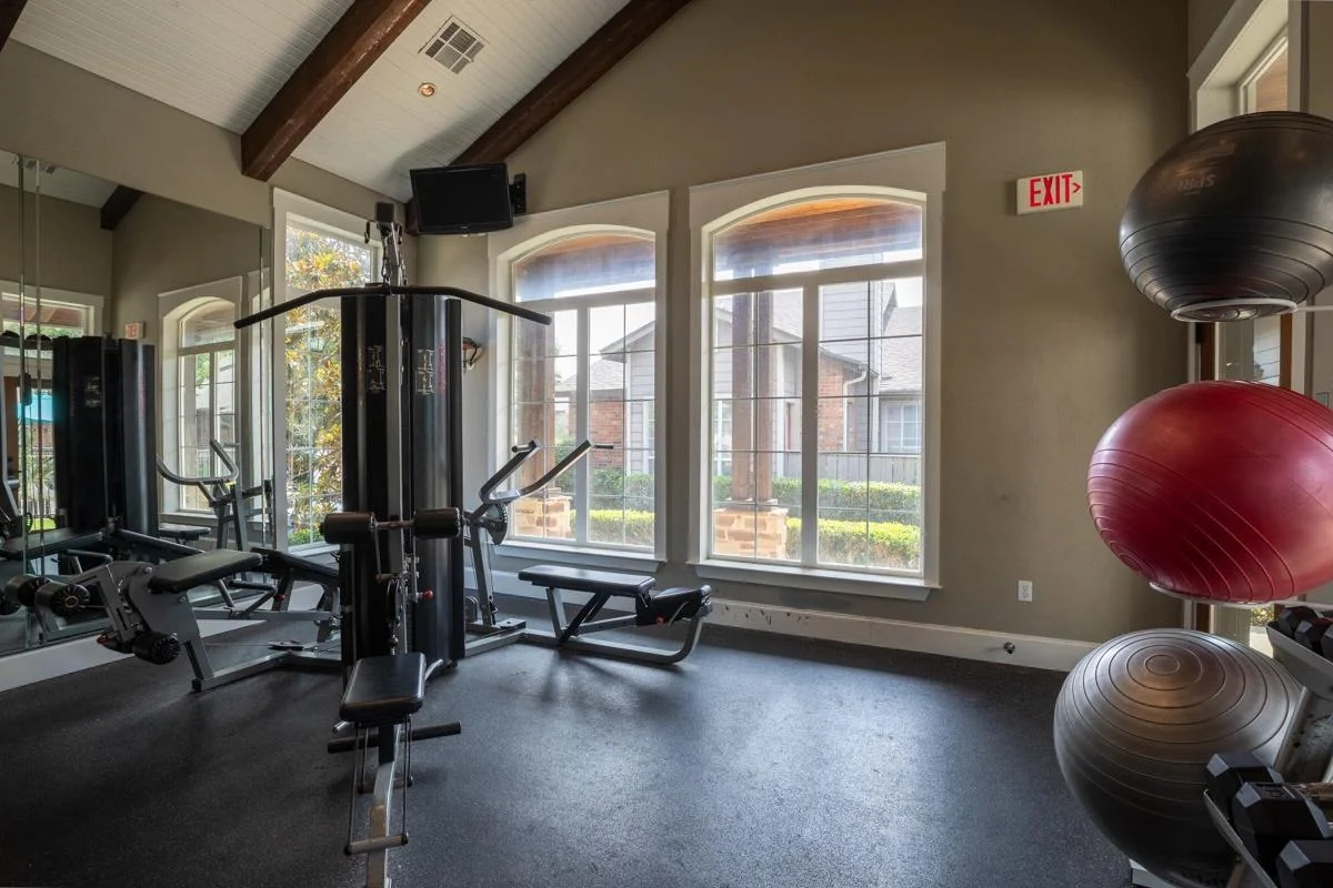 Fully equipped fitness center at Village Green of Bear Creek in Euless, Texas