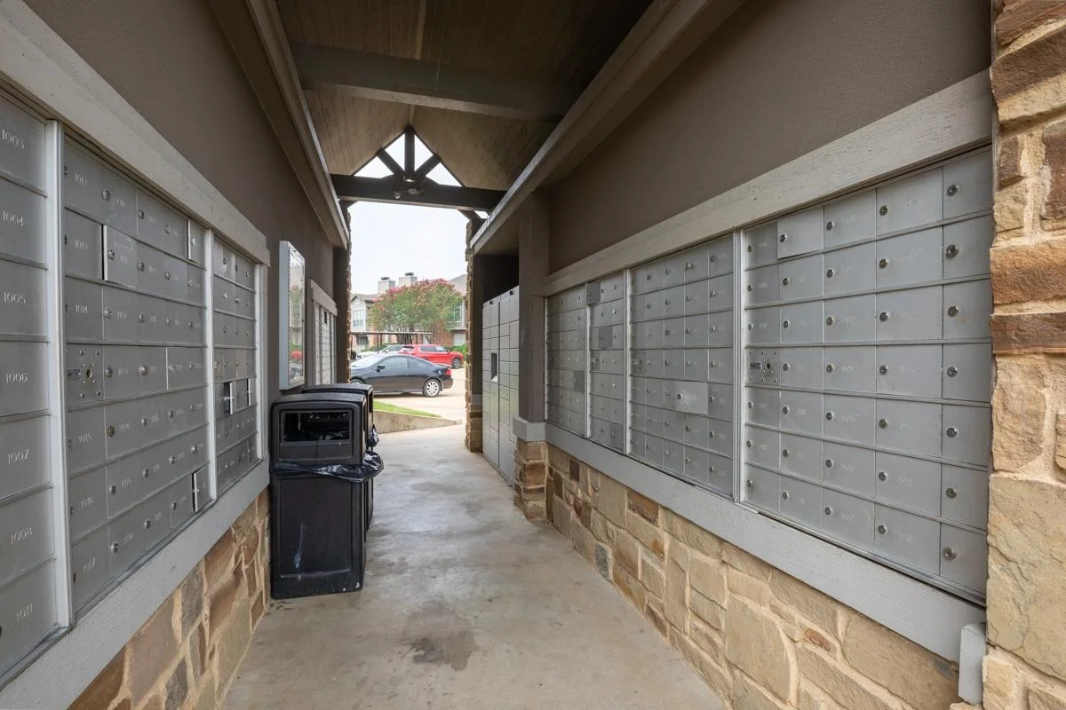 Covered resident mail center at Village Green of Bear Creek in Euless, Texas