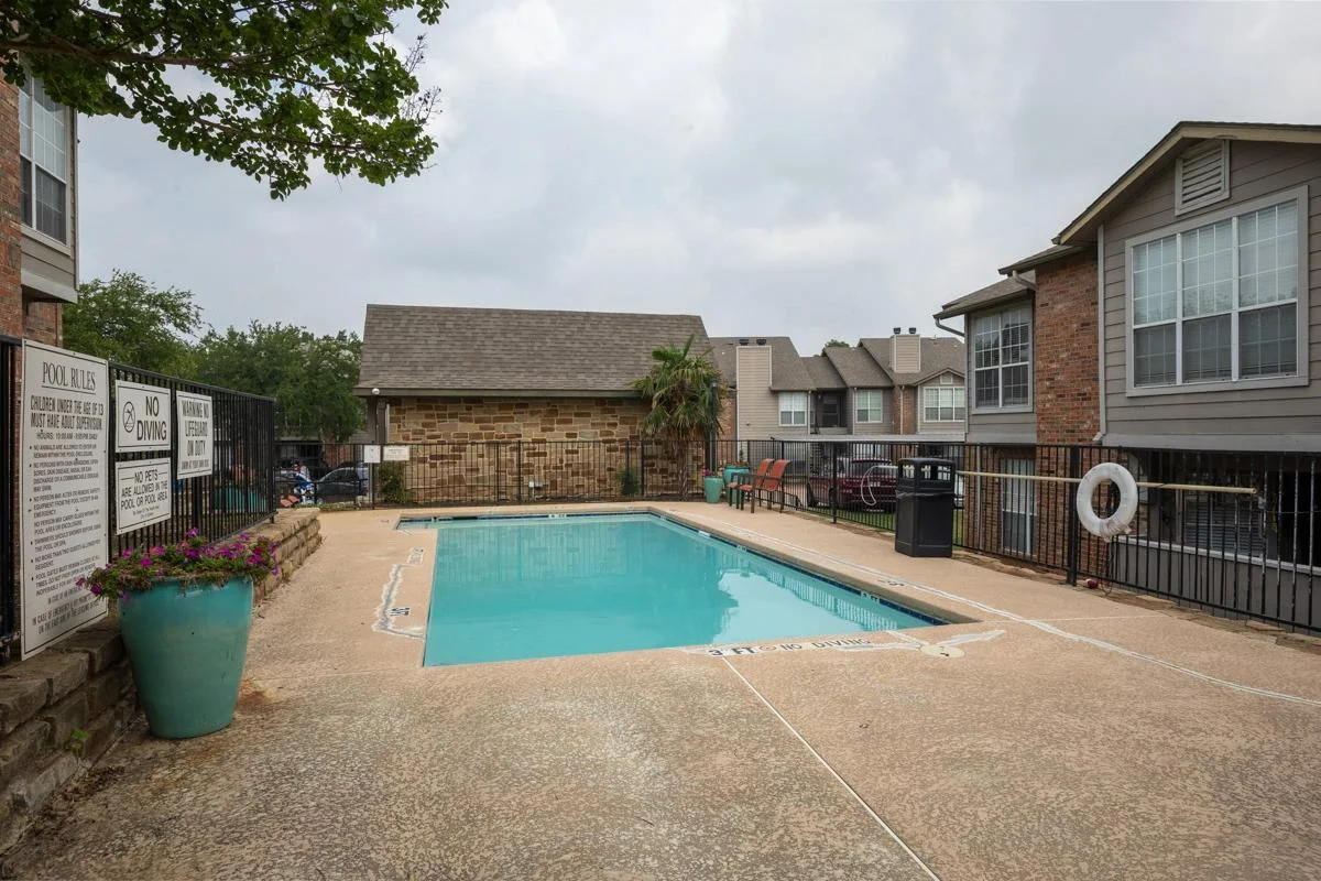 Community swimming pool at Village Green of Bear Creek in Euless, Texas