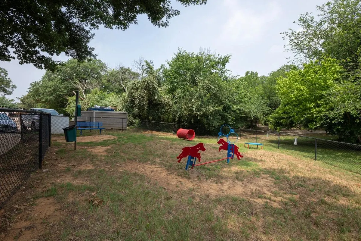 Dog park agility area at Village Green of Bear Creek in Euless, Texas