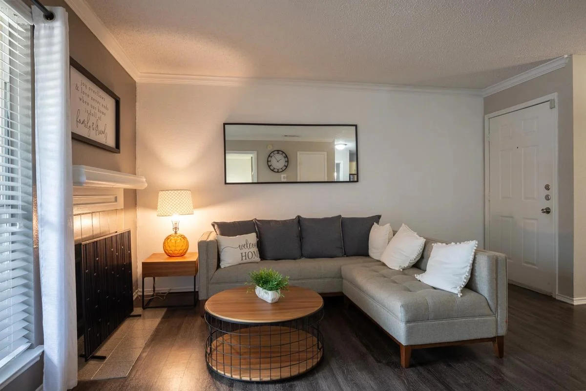 Living room and entry view at Village Green of Bear Creek in Euless, Texas